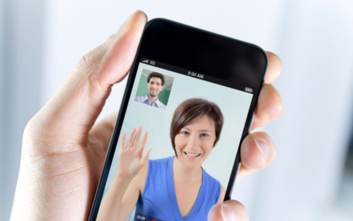 Couple enjoying a video call from smartphone