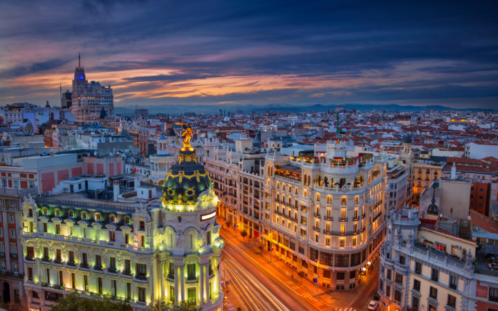 Cityscape image of Madrid, Spain during sunset.
