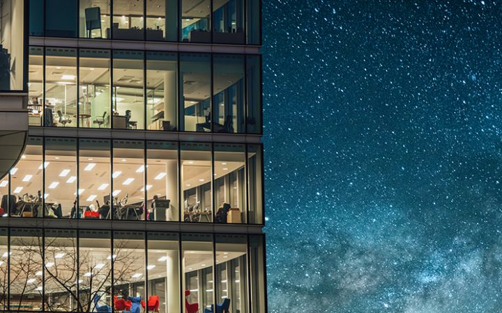 a night-time shot of a fashionable office